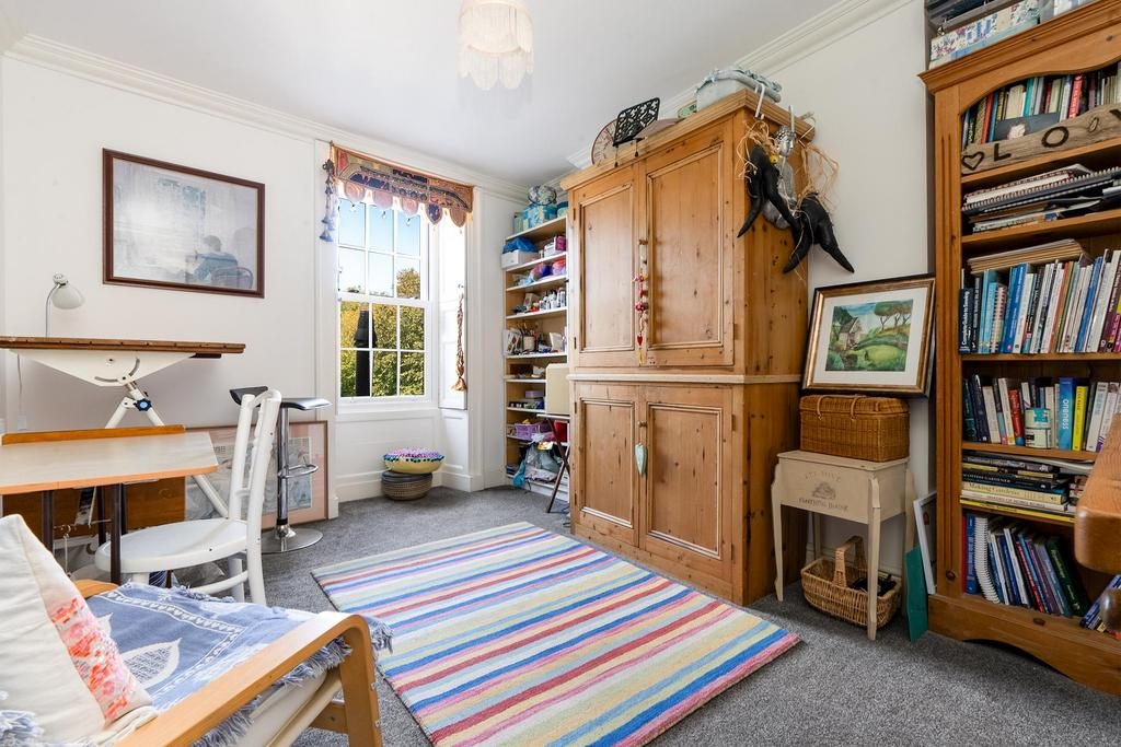 Study with bookshelves and a desk