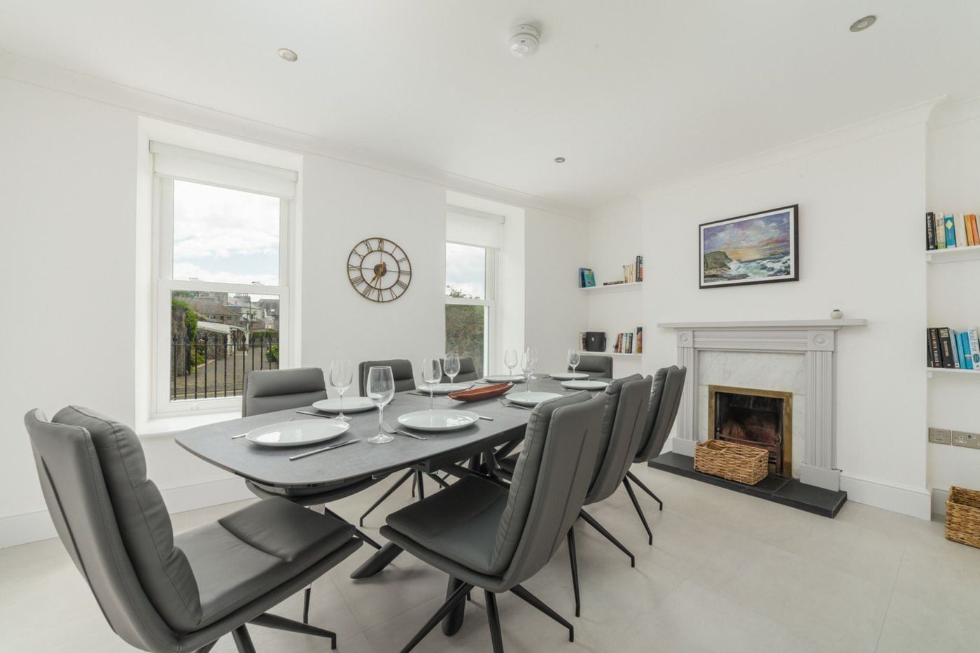 Dining room seating eight, with fireplace
