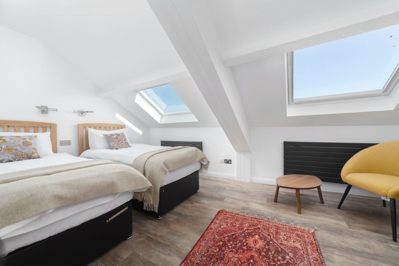 Twin bedroom under the eaves with skylights